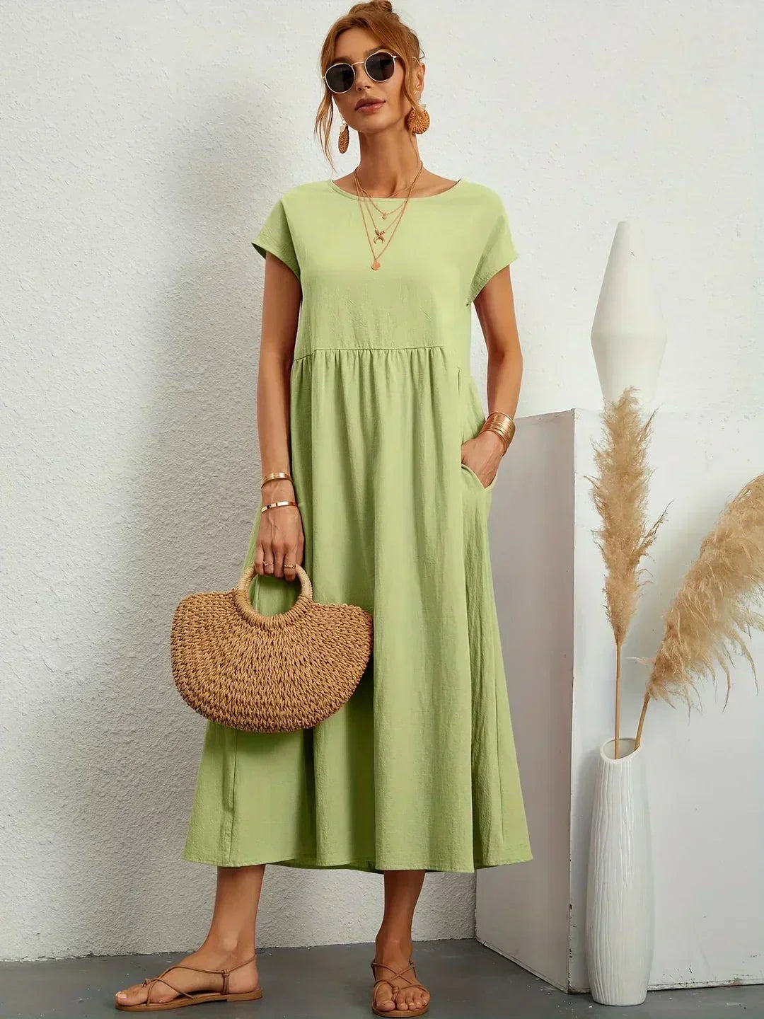Gabrielle flowing midi dress in mint green, full-length front view