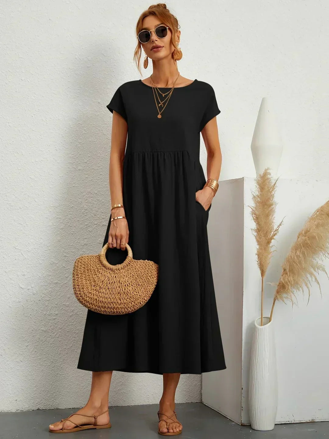 Gabrielle flowing midi dress in black, full-length front view