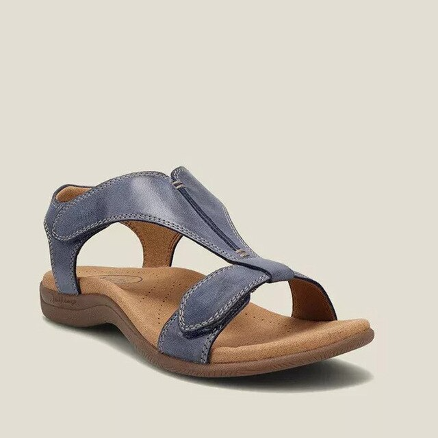 Orthopaedic T-strap sandals in dark blue, angled front view