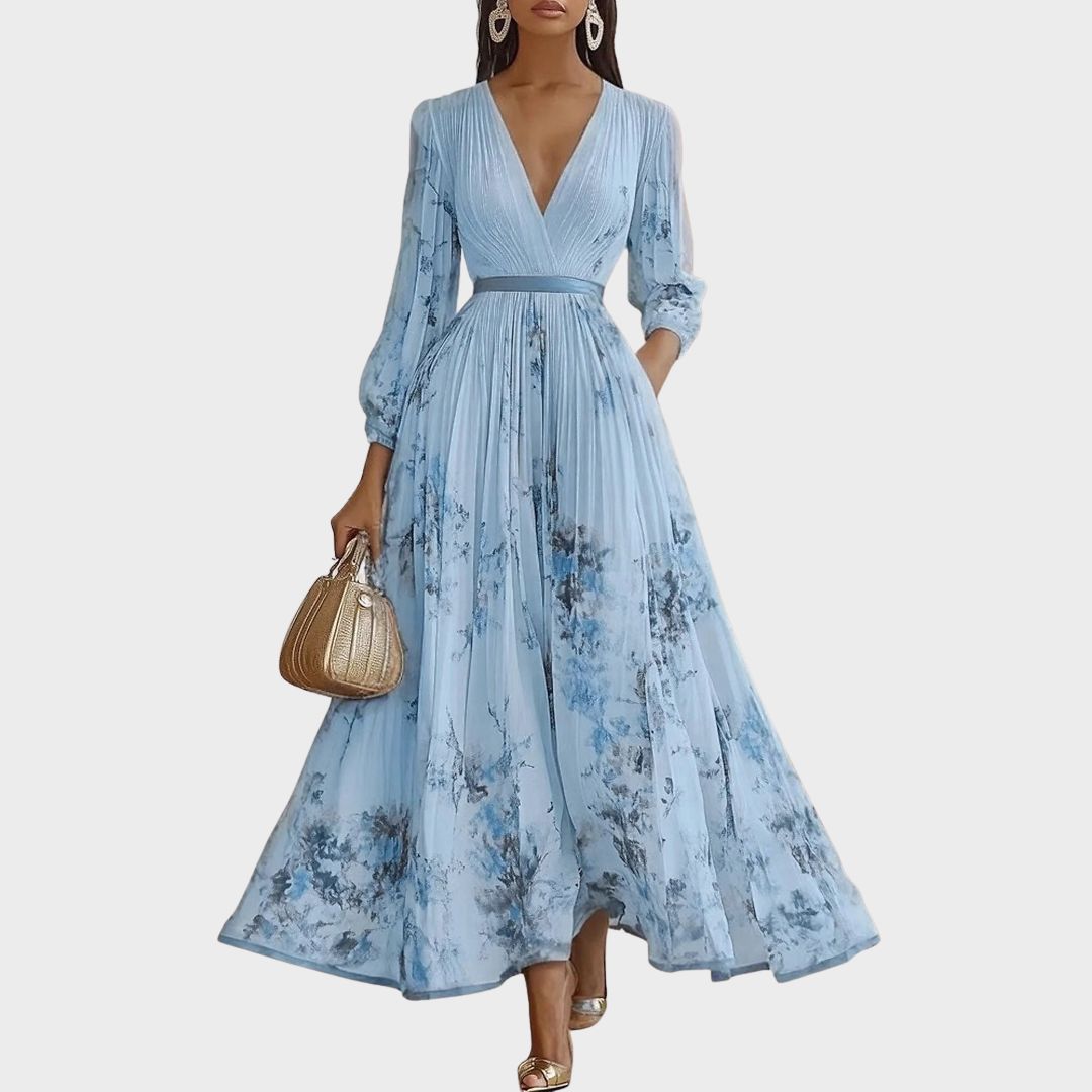 Rowella pleated maxi dress in blue with long sleeves, full-length view