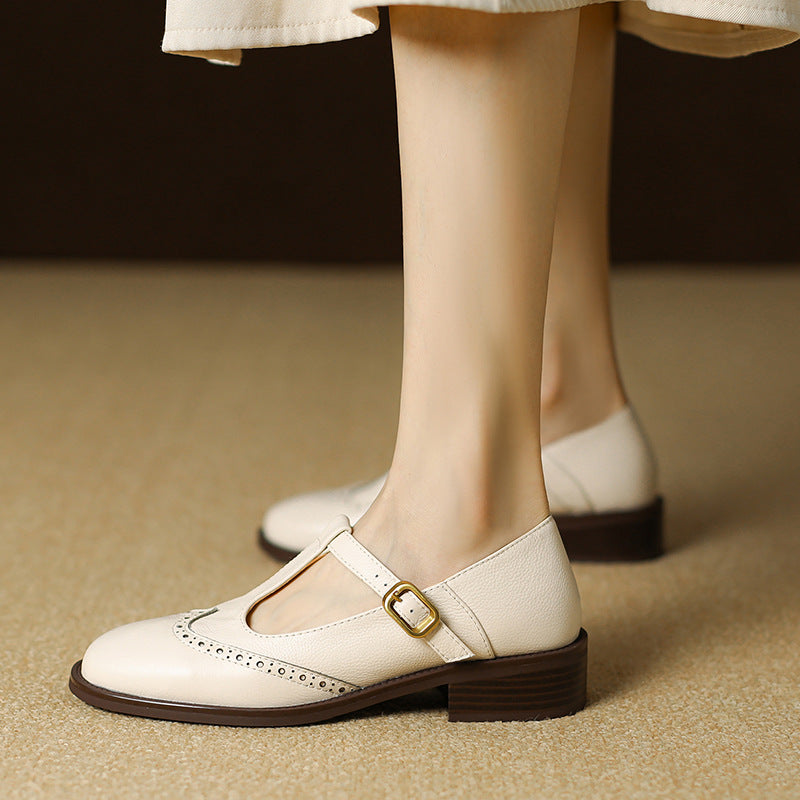 Ysolenne T-bar Mary Janes in beige, worn side view