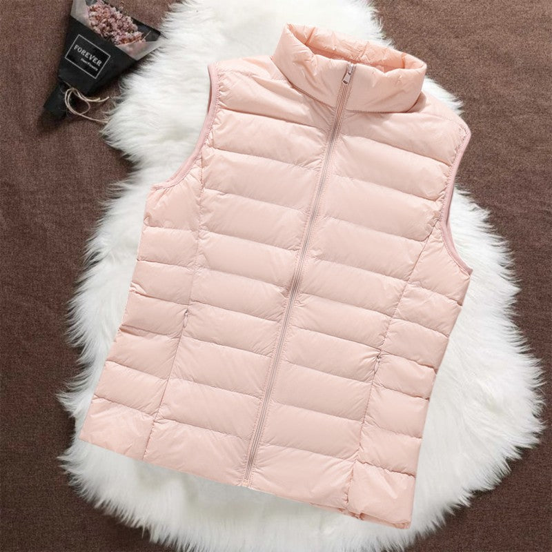 Isa padded gilet in light pink, flat front view with zip and stand collar
