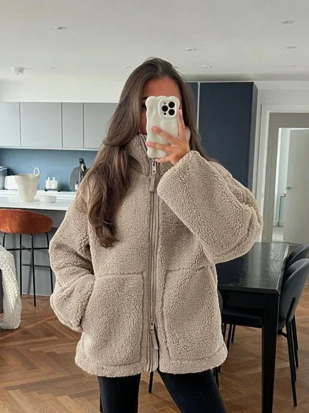 Araminta warm winter jacket in light brown teddy fleece, front view worn open