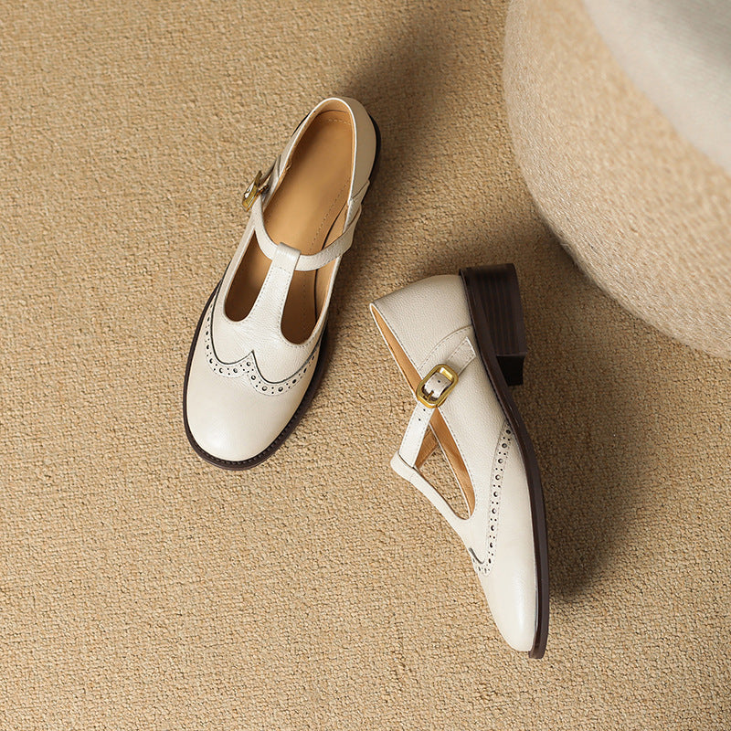 Ysolenne T-bar Mary Janes in beige, pair shown from above