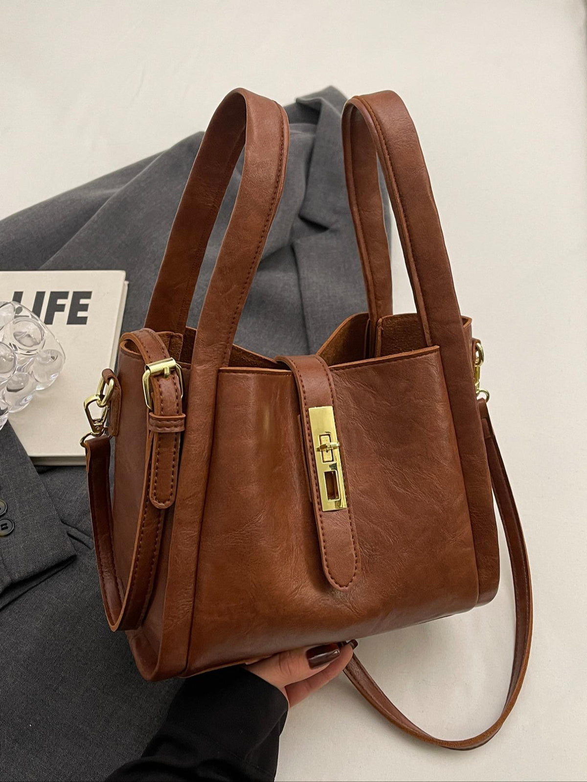 Gypsy retro crossbody handbag in copper brown, angled view