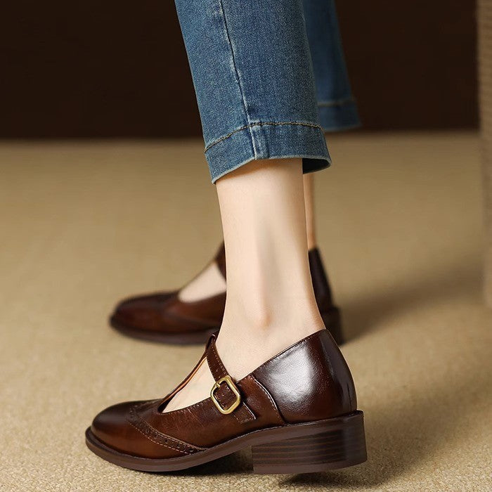 Ysolenne T-bar Mary Janes in brown, worn with jeans