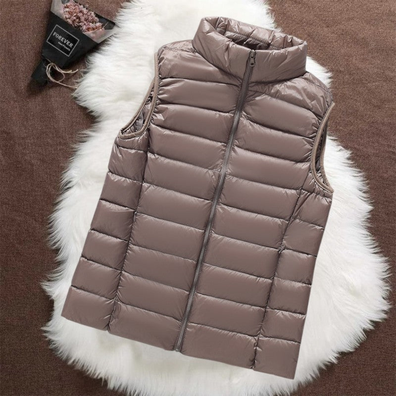 Isa padded gilet in champagne, front view with stand collar and zip