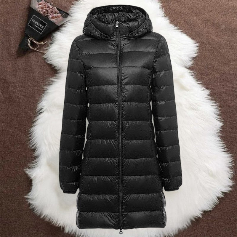 Helsa long padded jacket in black, flat product view showing zip and hood