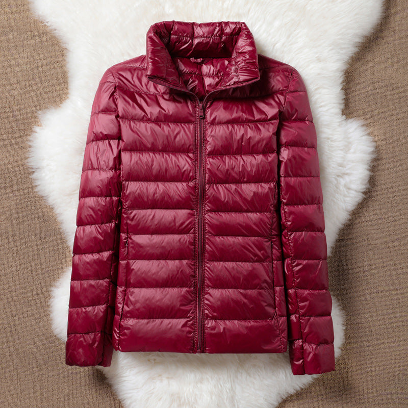Ulla padded jacket in dark red, flat product view with high collar and zip