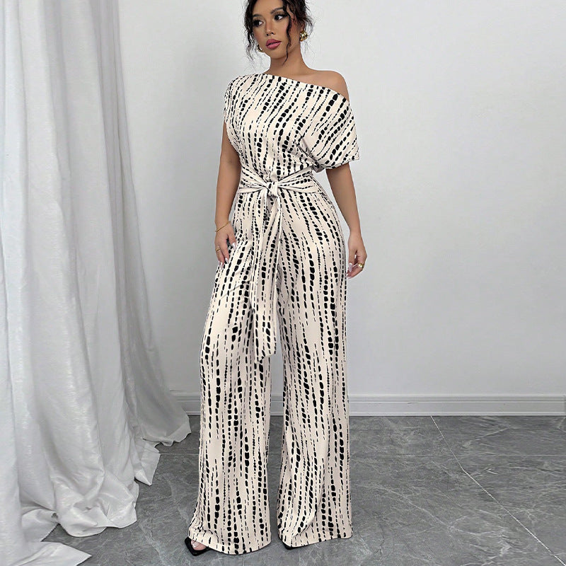 Amarise wide-leg jumpsuit in cream and black print, full-length front view