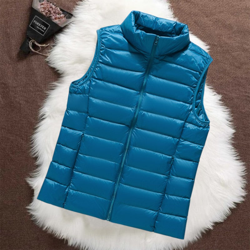Isa padded gilet in sky blue, flat front view with stand collar and zip
