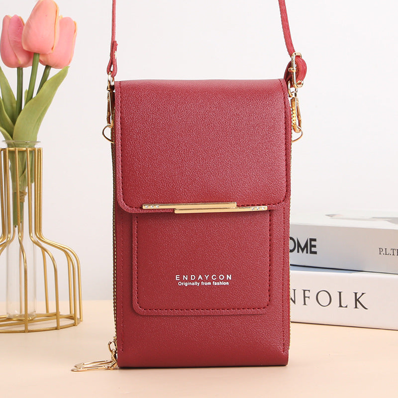 Eliza touch screen phone bag in wine red, front view