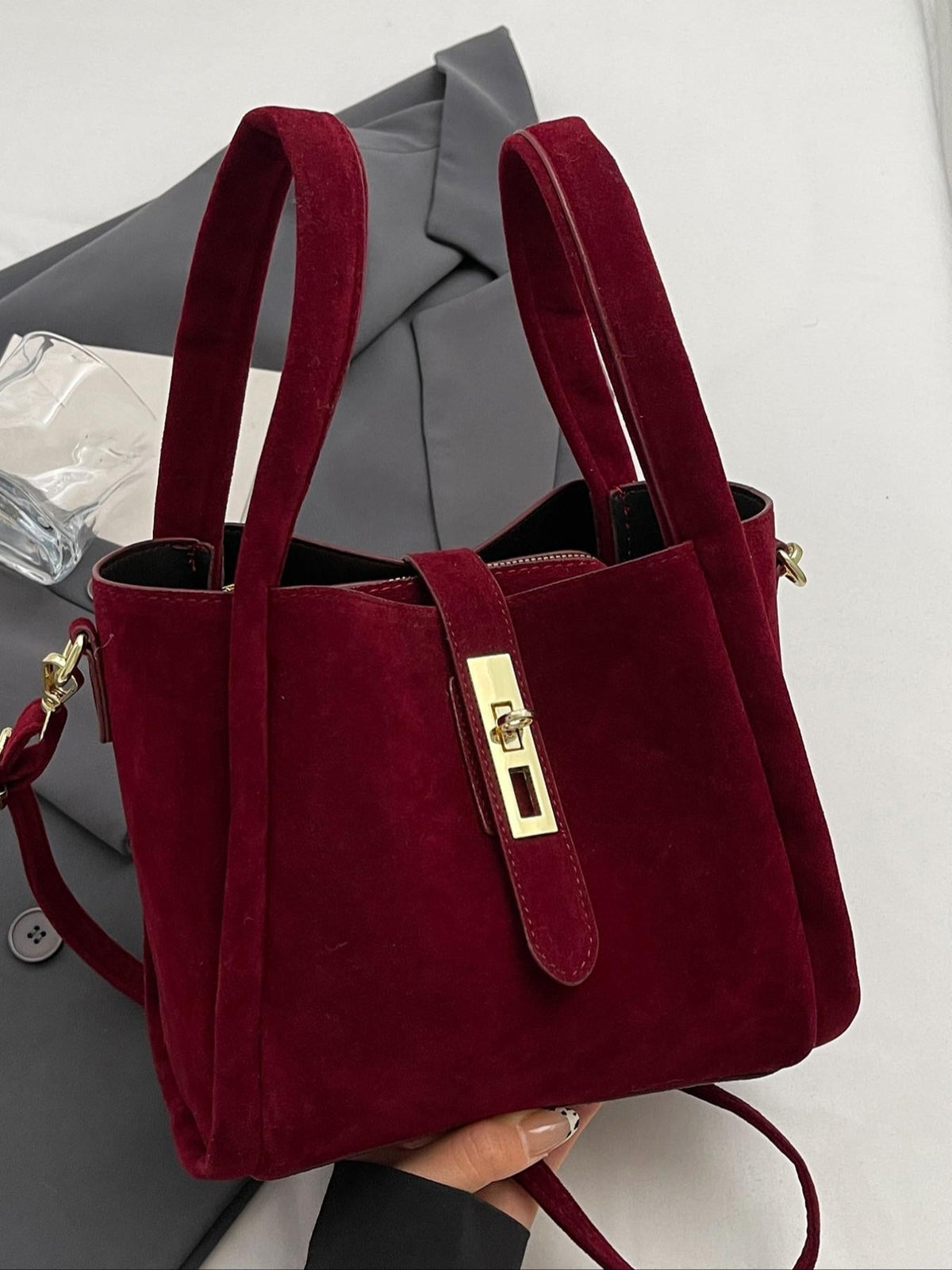 Gypsy retro crossbody handbag in burgundy, angled view