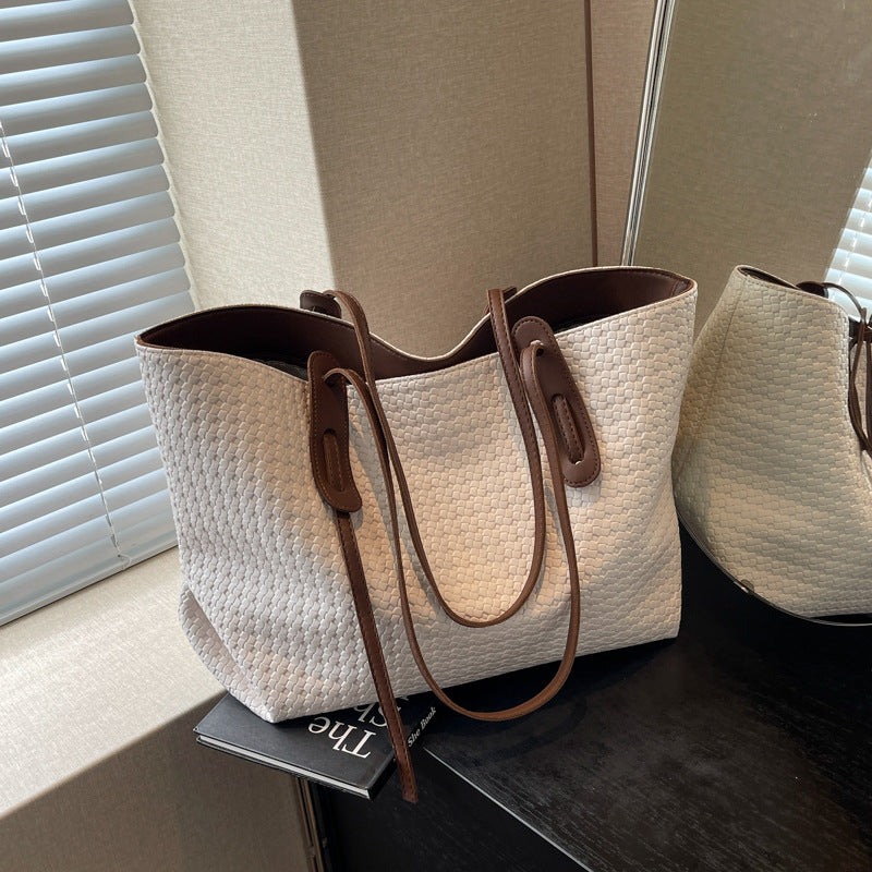 Arden woven tote bag in white with contrast straps, side view