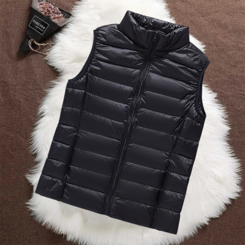 Isa gilet in black, sleeveless front view with stand-up collar and zip