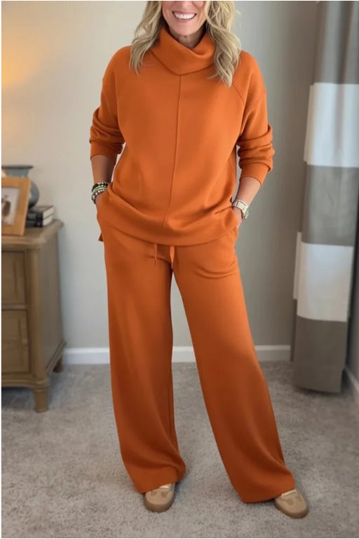 Corinne two-piece set in orange, full-length front view