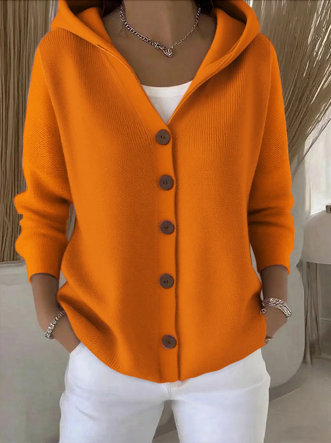 Rocío hooded knit cardigan in orange, front view