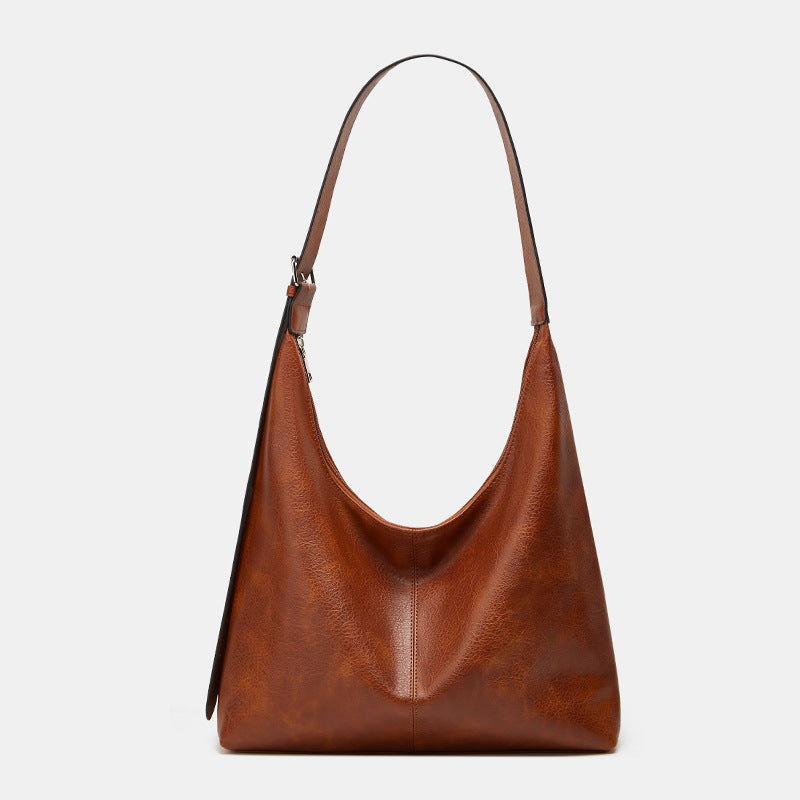Victoria large capacity shoulder bag in brown, front view