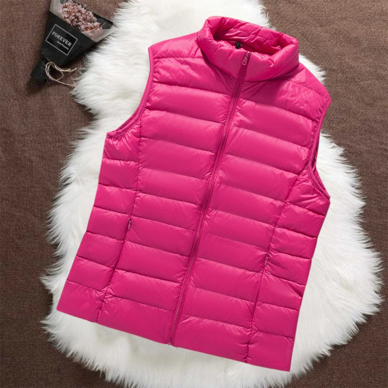 Isa padded gilet in pink, flat front view with stand collar and zip
