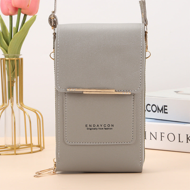 Eliza touch screen phone bag in grey, front view