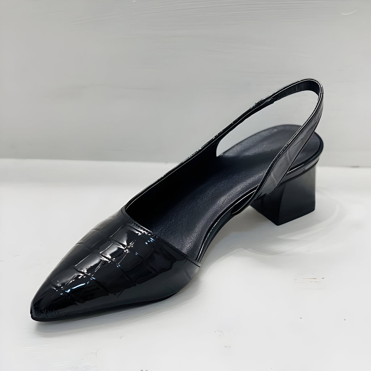 Victoria croc-effect slingback court shoe in black, side view