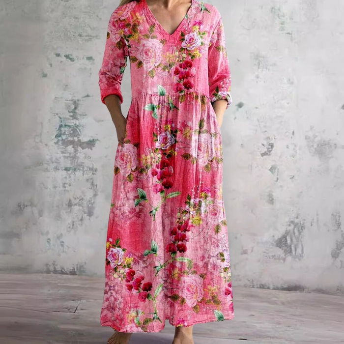 Wenda floral maxi dress in pink, full-length front view with hands in pockets