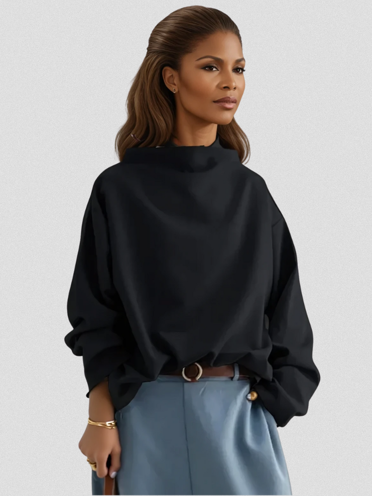 Elspeth high-neck casual top in black, front view with blue trousers