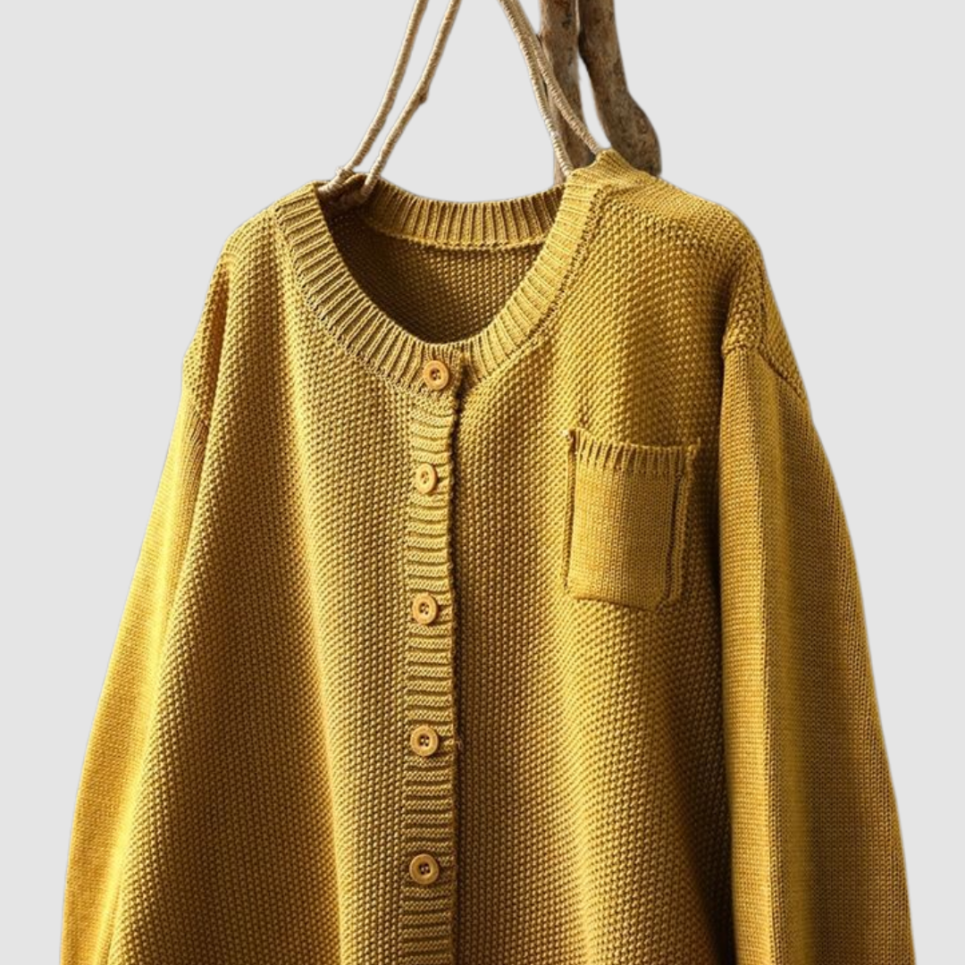 Elowira knit cardigan in yellow, close-up of buttons and chest pocket