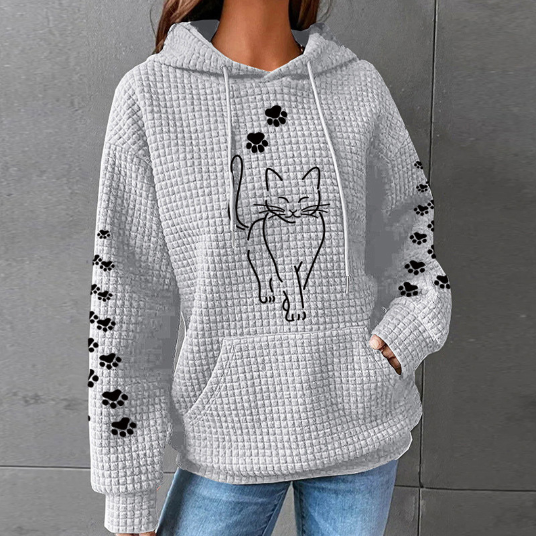 Savannah cat print hoodie in grey, front view with hand in pouch pocket
