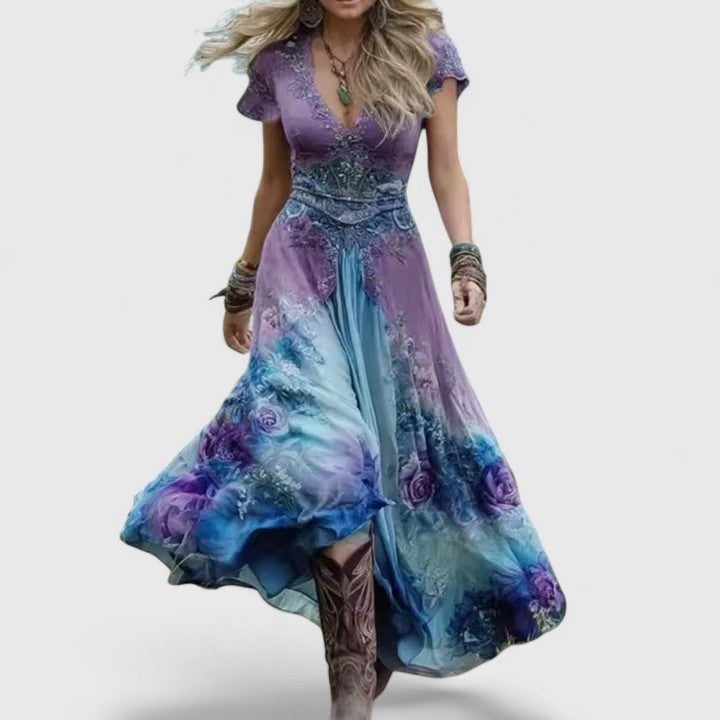Sylvia embroidered maxi dress in blue and purple, walking front view