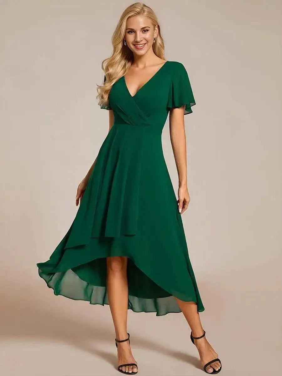 Ismey elegant flowing dress in green, full-length front view