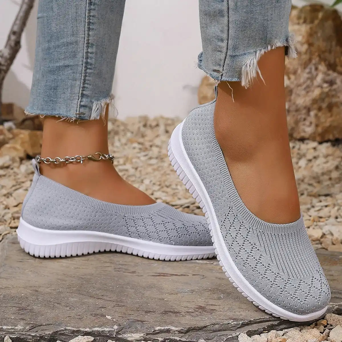 Estella slip-on shoes in grey, close-up of flat sole and elastic opening
