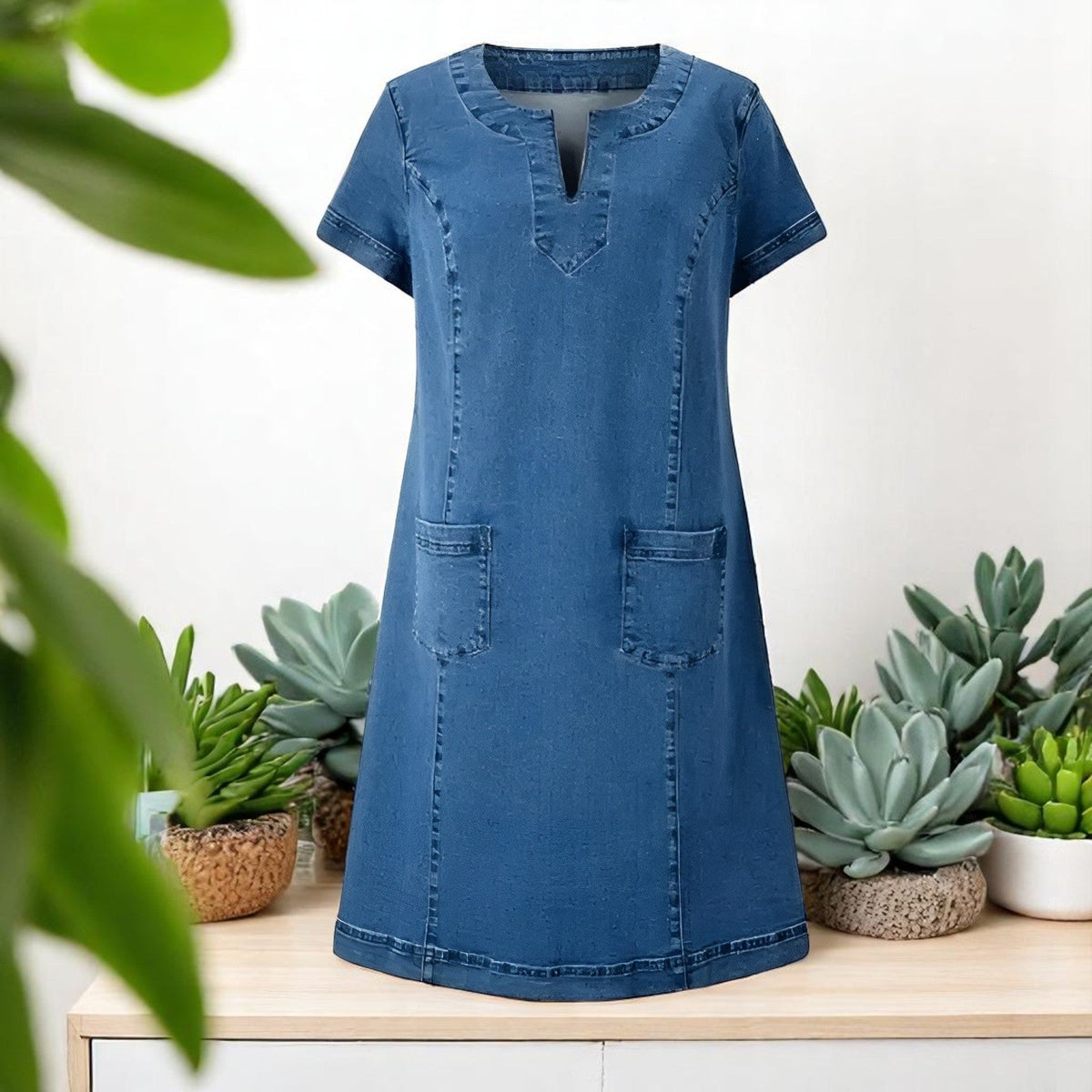 Sky denim dress in mid blue, product-only front view