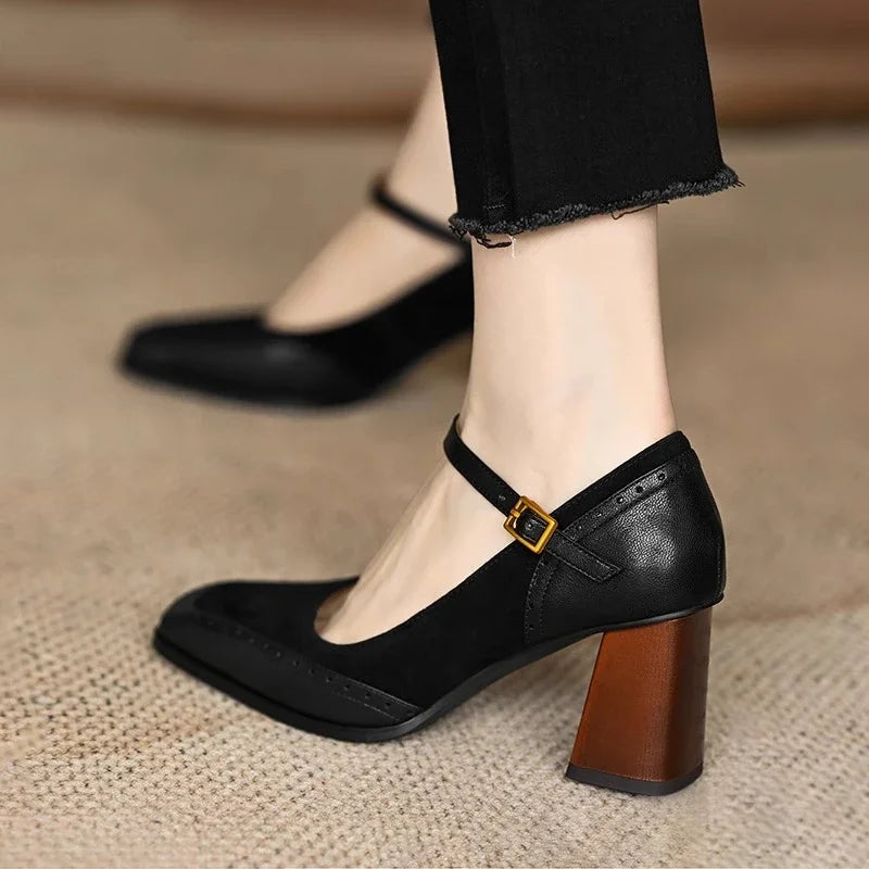 Ellie classic pumps in black, worn front view