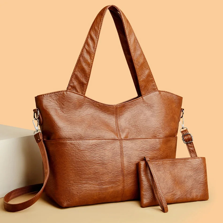 Comfort shoulder bag in brown with matching zip pouch, front view