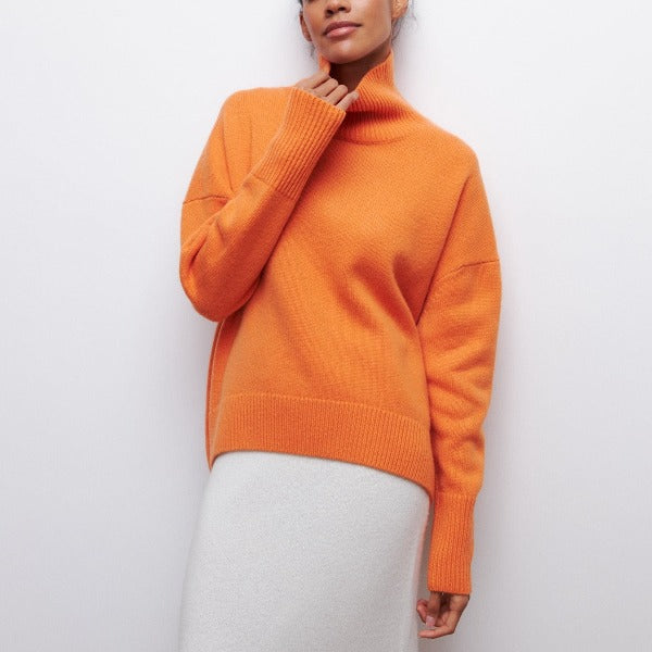 Adrianelys high-neck sweater in orange, front view