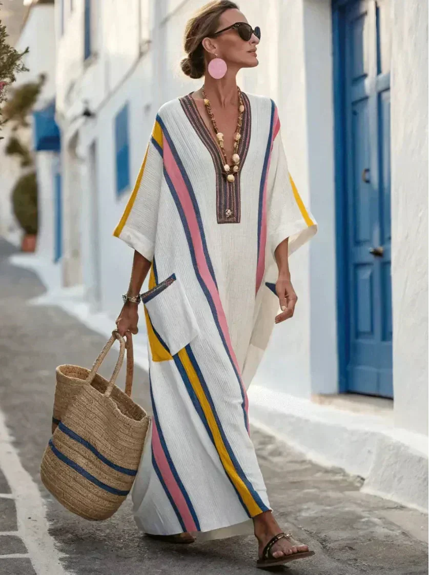 Vera maxi kaftan dress in pink, yellow and blue stripes, walking front view