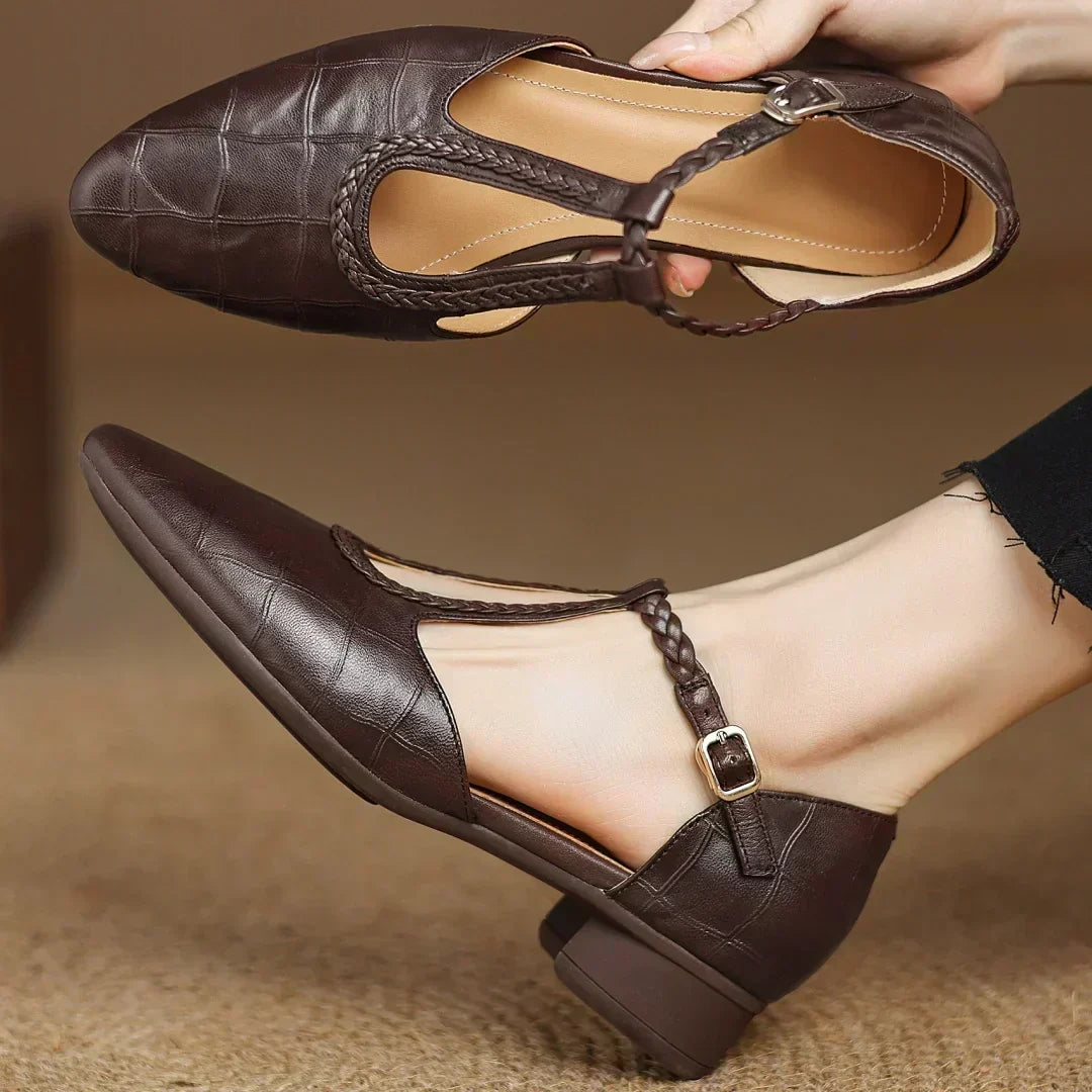 Evelyn Mary Janes in brown, showing buckle strap and low block heel