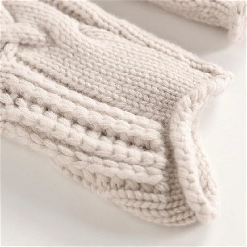 Nivora sweater in beige, close-up of ribbed cuff
