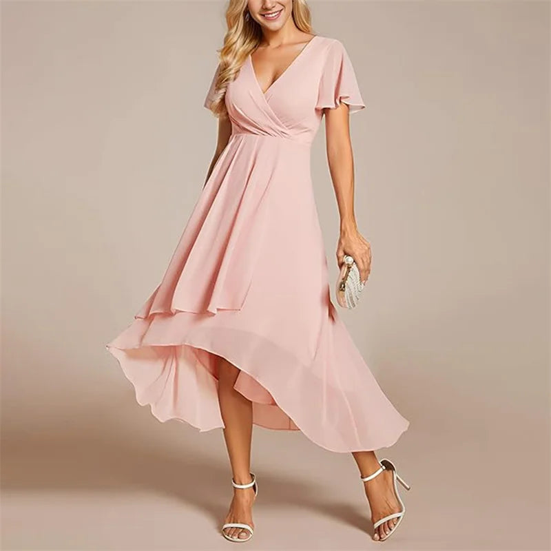 Ismey elegant flowing dress in pink, full-length front view