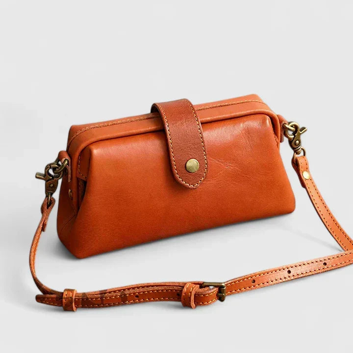 Isola structured leather shoulder bag in tan orange, front view