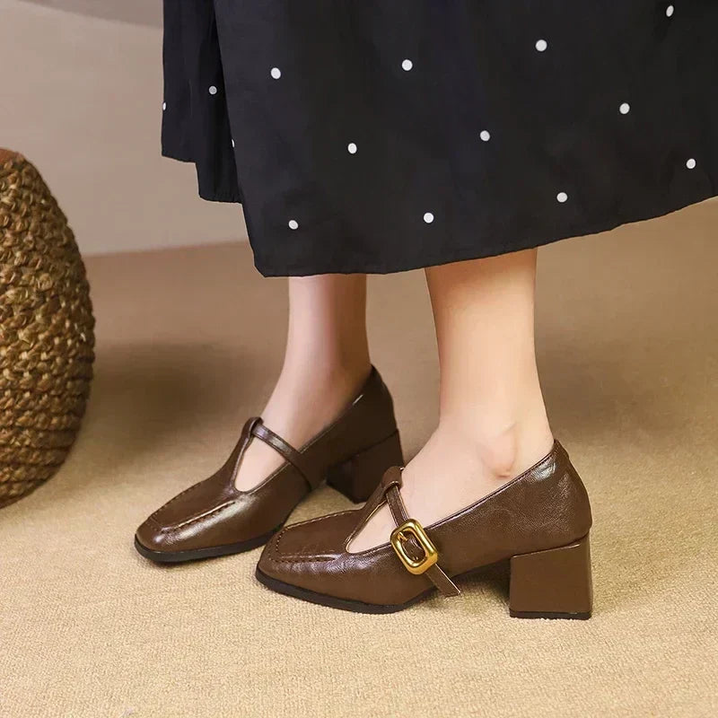 Rosa Mary Janes in brown, worn front view with block heel