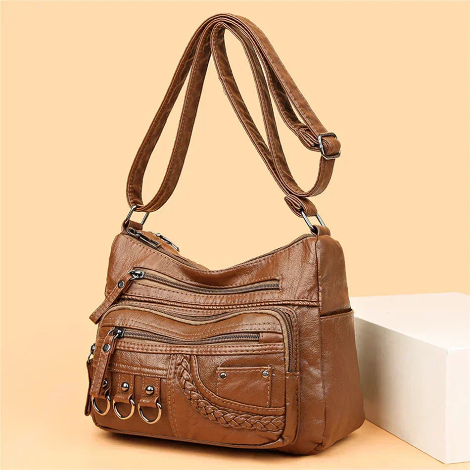 Olivia shoulder bag in brown with braided front pocket