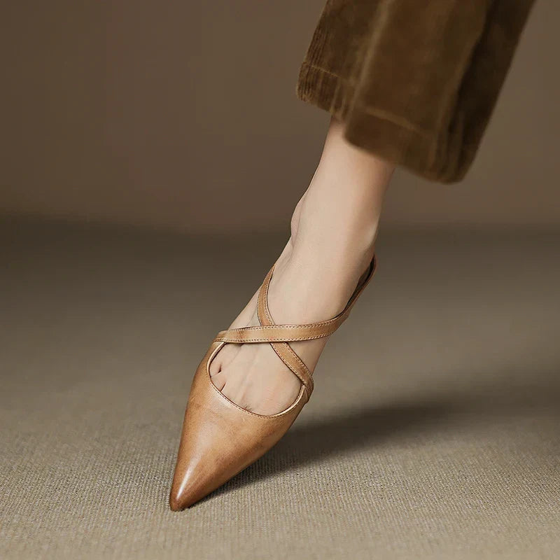 Aluna leather mules in apricot, close-up of crossed straps
