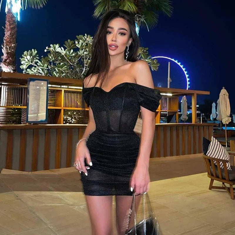 Remy sparkle mini dress in black, off-shoulder front view