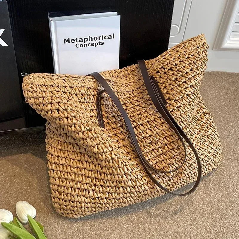 Large woven tote bag in brown with long dark shoulder straps