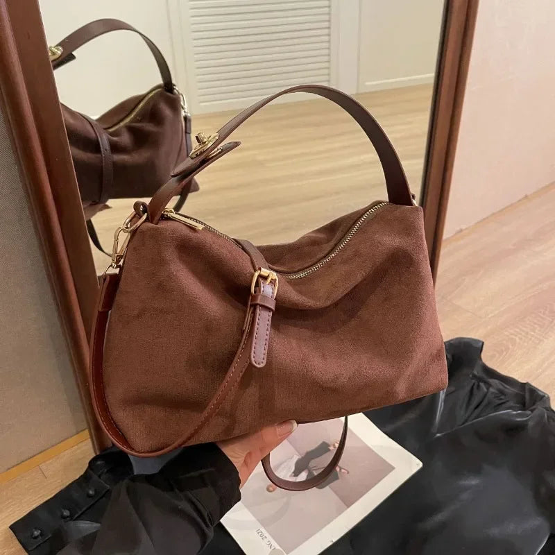 Marielle shoulder bag in brown, side view with buckle strap detail