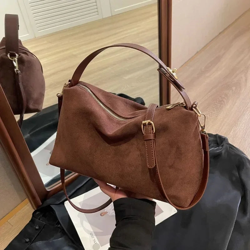 Marielle minimalist shoulder bag in brown, angled view with top handle