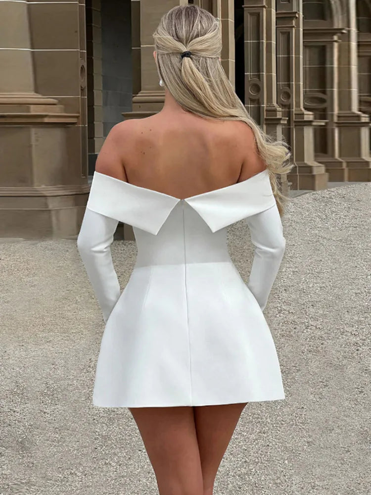 Nyra skater dress in white, back view showing folded off-shoulder band