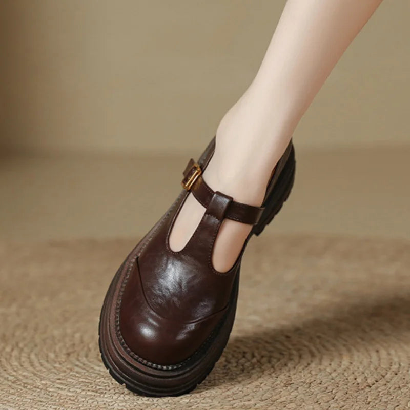 Luna classic T-bar shoes in brown, close-up side view on model